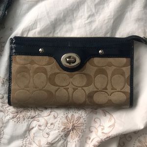 Tan and navy coach wallet